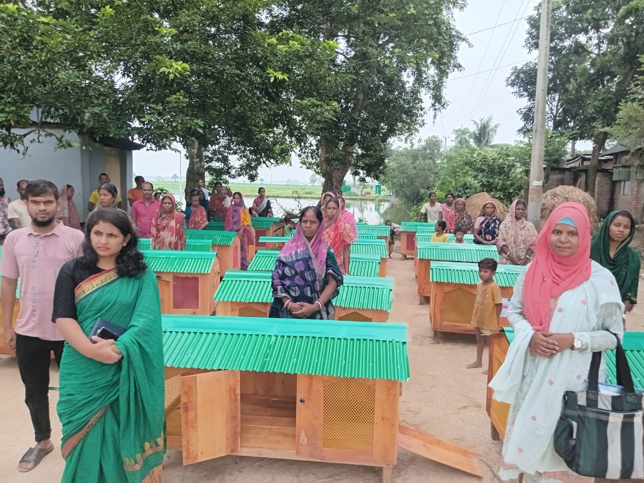 Ghashful CARE Project Distributes Climate-Resilient Poultry Sheds to Indigenous Women in Naogaon